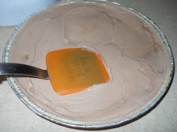 use a spatula to spread the ice cream out. 