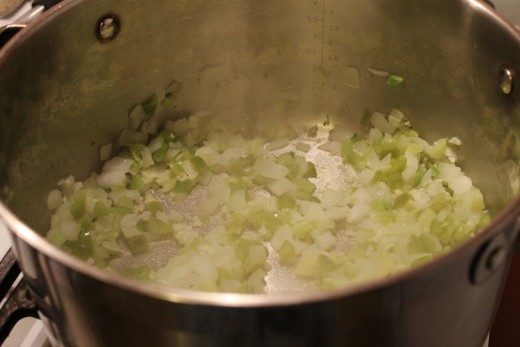 The celery, onion, green bell pepper and garlic cooking. 